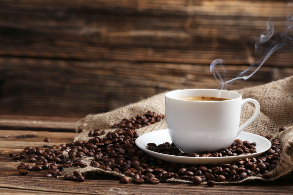 Cup of coffee with coffee beans